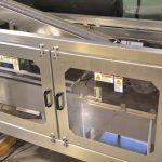 high speed lid placer Enclosed